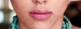 Lips E: Very full, very rounded, and very luscious lips, notably rounded and larger with a plump appearance